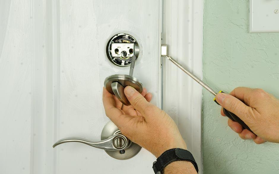 comment changer un barillet de porte fermée Paris 9